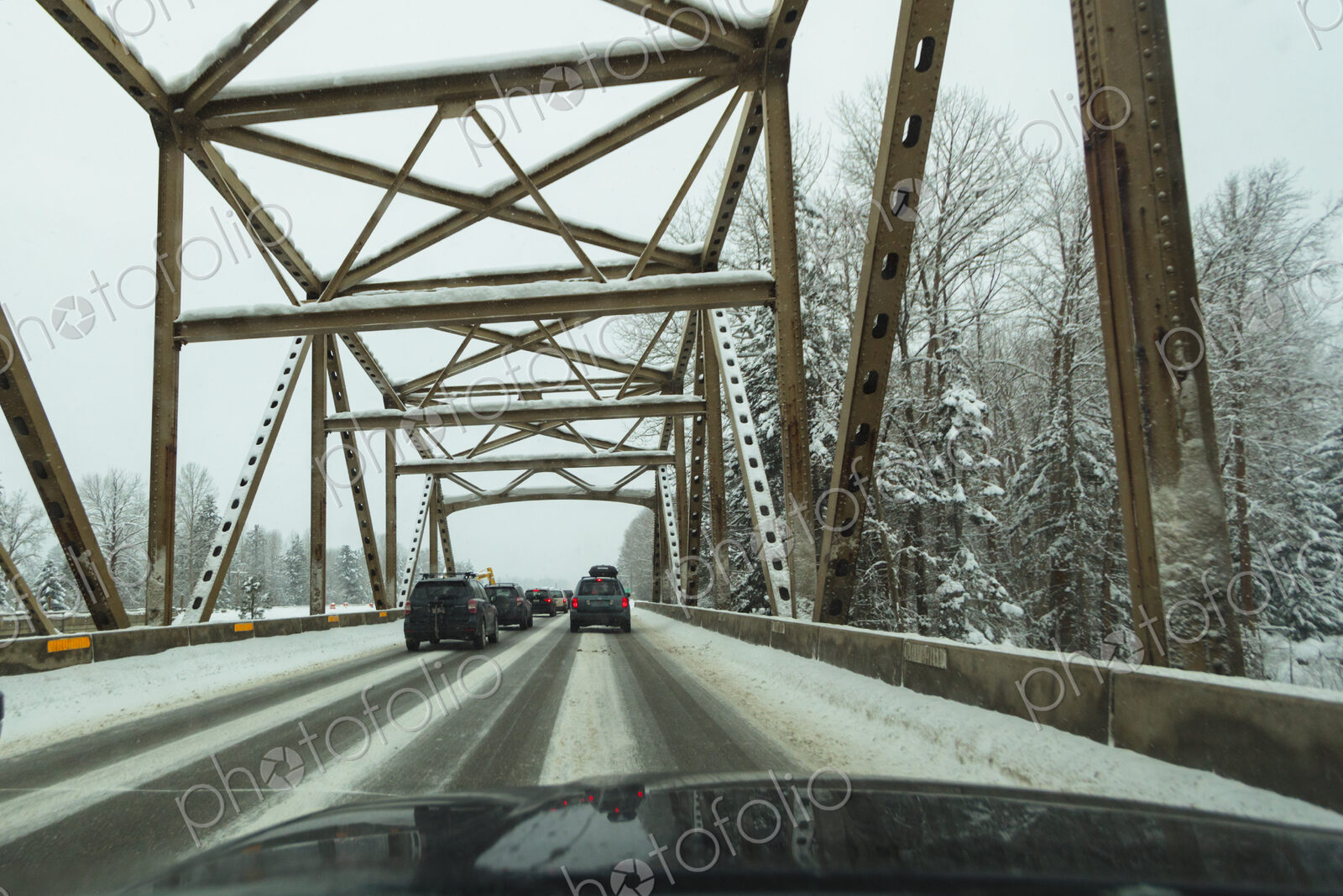 Traffic jam of cars on snowy bridge on Interstate 90, Cle Elum, WA USA
