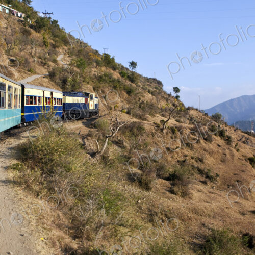 Train Traveling Through Countryside