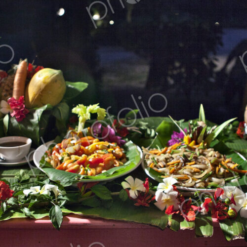 Tropical Food Laid Out On Table At Night