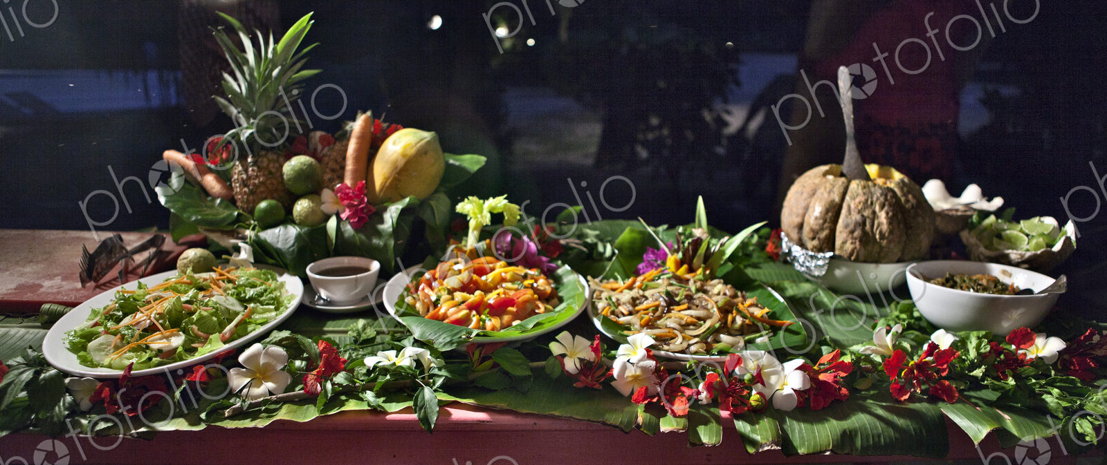 Tropical Food Laid Out On Table At Night