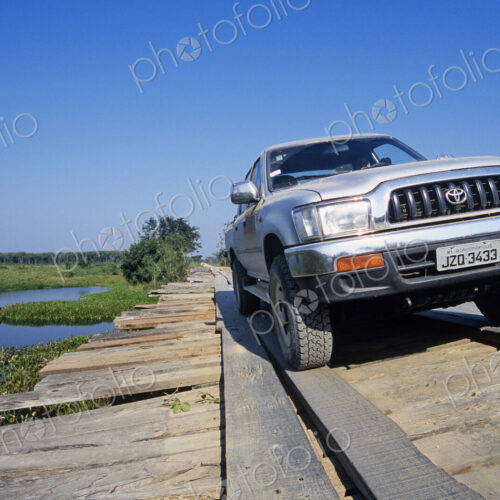 Truck Crossing Old Wooden Bridge Truck Crossing Old Wooden Bridge
