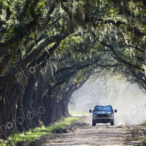 Truck Driving Down Dirt Road Truck Driving Down Dirt Road