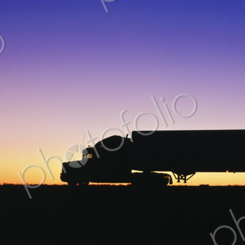 Truck Parked on Freeway at Sunrise Truck Parked on Freeway at Sunrise