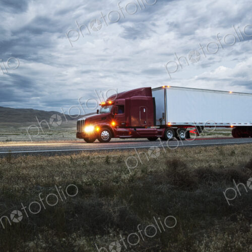 Truck on a highway through the grasslands area of eastern Washington, USA. Truck on a highway through the grasslands area of eastern Washington, USA.