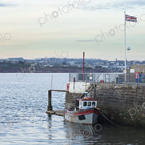 Tugboat Docked on Water Tugboat Docked on Water