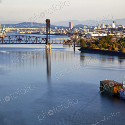 Tugboat Pushing Barge in River