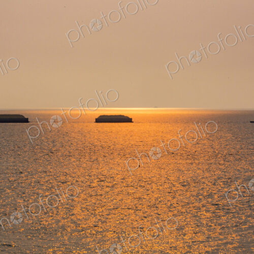 Tugboat hauling two sand barges, Strait of Juan de Fuca.