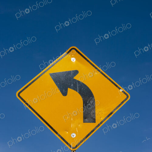 Turn arrow symbol on metal street sign, Canyon Road, Yakima WA USA Turn arrow symbol on metal street sign, Canyon Road, Yakima WA USA