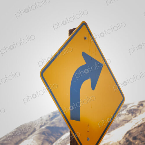 Turn arrow symbol on metal street sign, Canyon Road, Yakima WA USA Turn arrow symbol on metal street sign, Canyon Road, Yakima WA USA