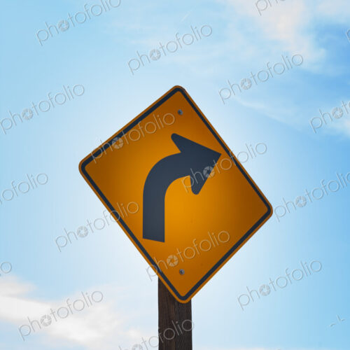 Turn arrow symbol on metal street sign, Canyon Road, Yakima WA USA Turn arrow symbol on metal street sign, Canyon Road, Yakima WA USA