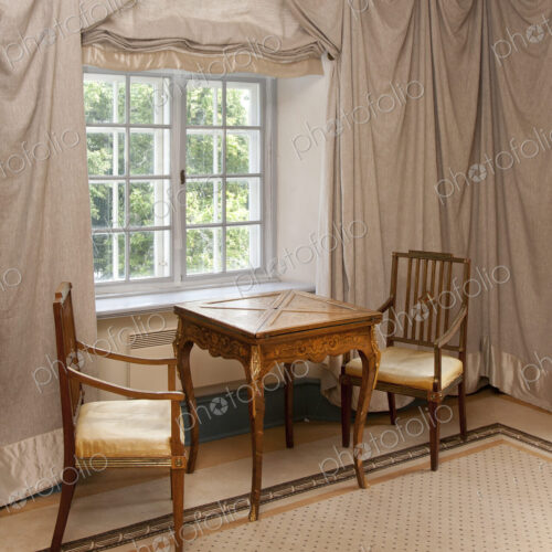 Two Chairs and a Small Table