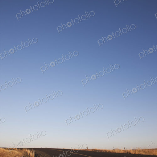 Two Lane Road Between Fields Two Lane Road Between Fields
