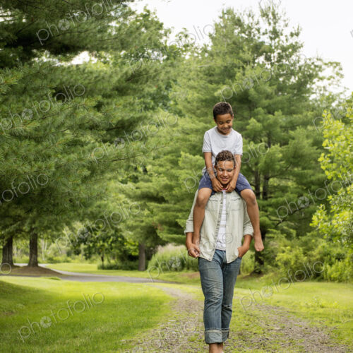 Two brothers walking on a country path.