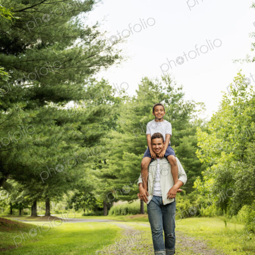 Two brothers walking on a country path.