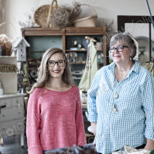 Two caucasian women in an antique store Two caucasian women in an antique store