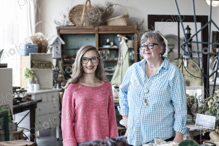 Two caucasian women in an antique store
