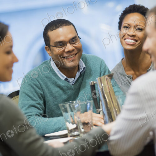 Two couples at dinner table