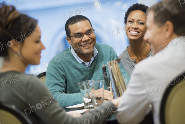 Two couples at dinner table