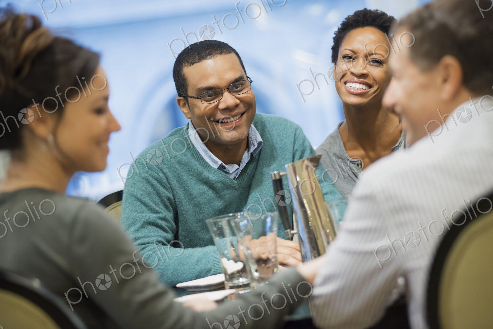 Two couples at dinner table