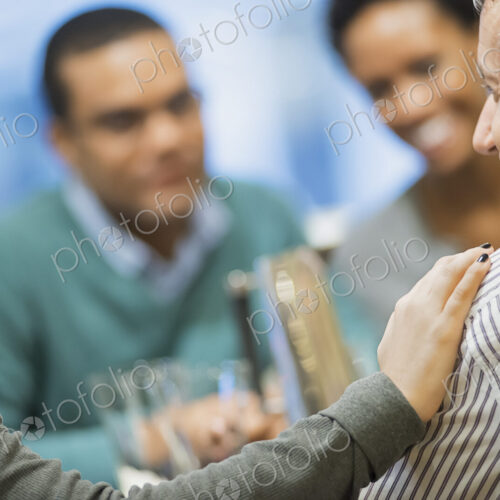 Two couples at dinner table