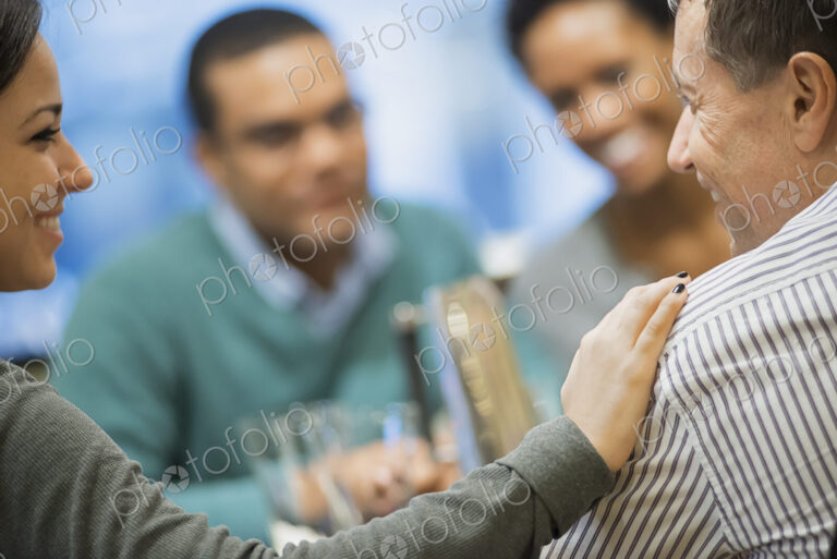 Two couples at dinner table