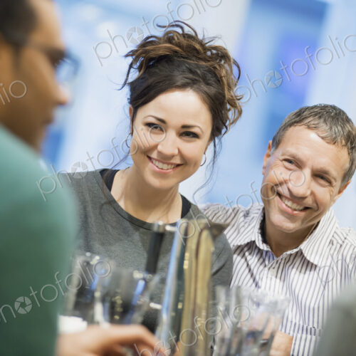 Two couples at dinner table