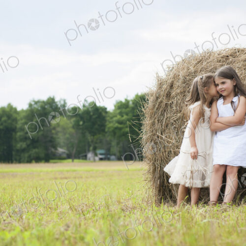 Two girls playing outdoors. Two girls playing outdoors.