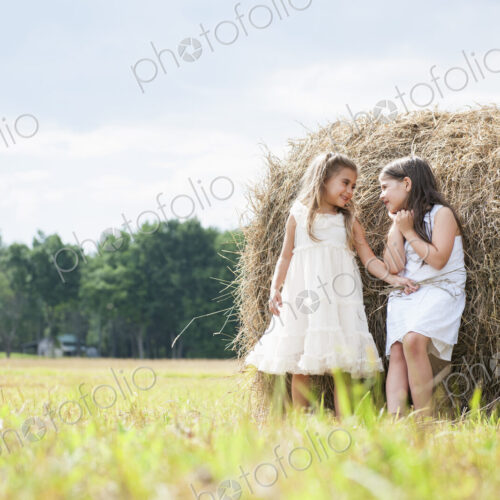 Two girls playing outdoors. Two girls playing outdoors.