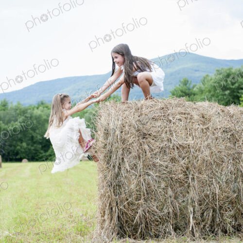 Two girls playing outdoors. Two girls playing outdoors.