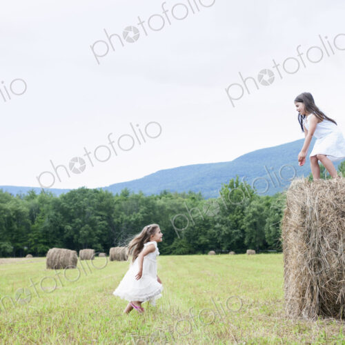 Two girls playing outdoors. Two girls playing outdoors.