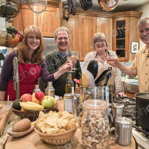 Two senior couples getting together for a dinner party.