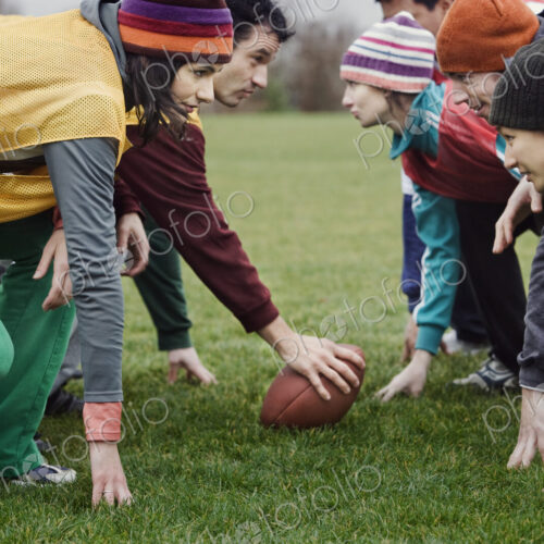 Two teams of friends lined up to play against one another in a game of non-contact… Two teams of friends lined up to play against one another in a game of non-contact…