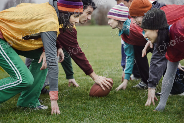 Two teams of friends lined up to play against one another in a game of non-contact…
