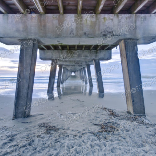 Tybee Island near Savannah, Tybee Pier at dawn, view of the underneath of the pier… Tybee Island near Savannah, Tybee Pier at dawn, view of the underneath of the pier…