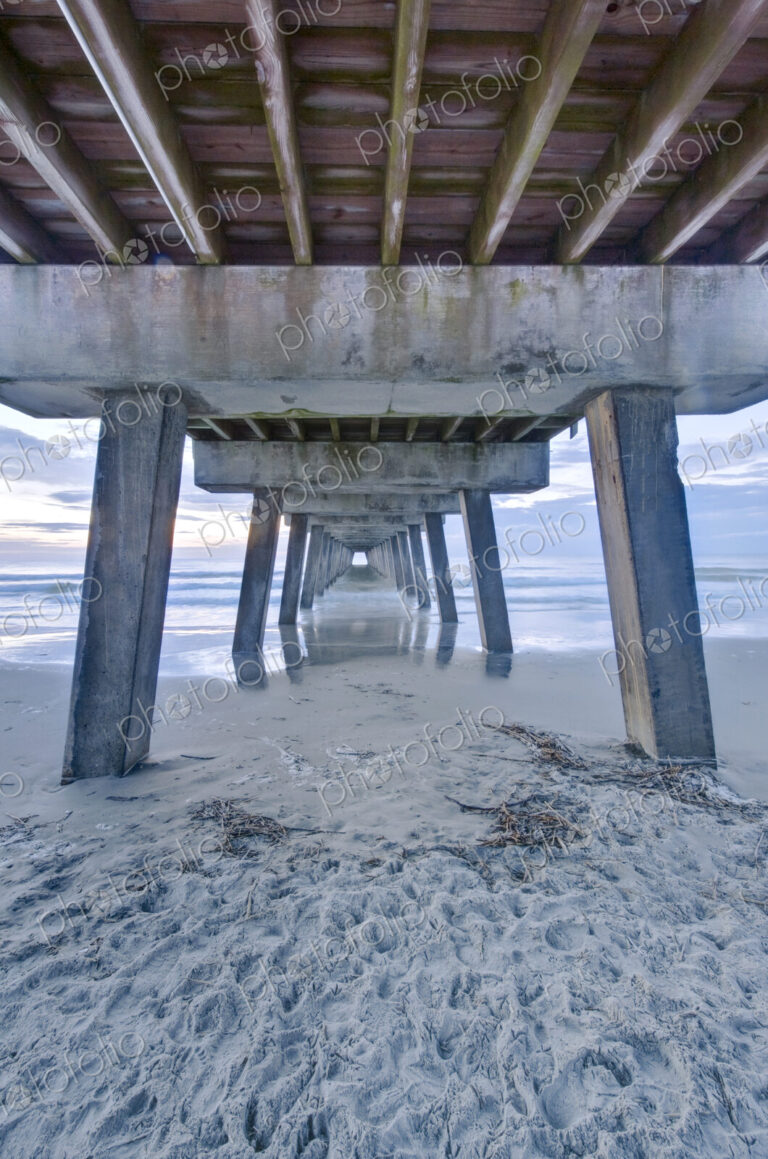 Tybee Island near Savannah, Tybee Pier at dawn, view of the underneath of the pier…