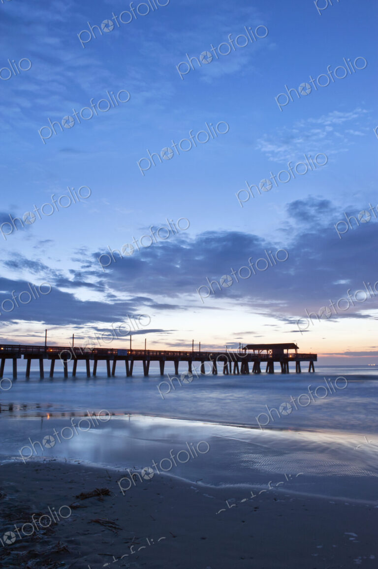 Tybee Island, view of the Tybee Pier reaching out into the sea at dawn