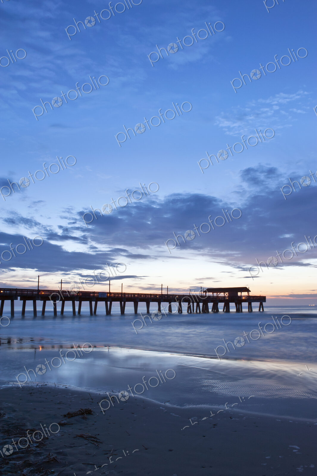 Tybee Island, view of the Tybee Pier reaching out into the sea at dawn