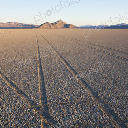 Tyre marks and tracks in the playa salt pan surface of Black Rock Desert, Nevada.