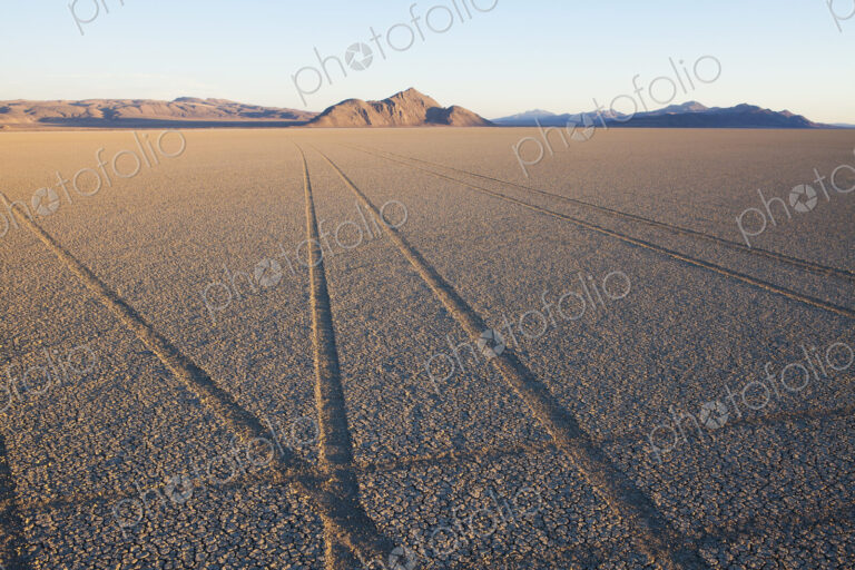Tyre marks and tracks in the playa salt pan surface of Black Rock Desert, Nevada.