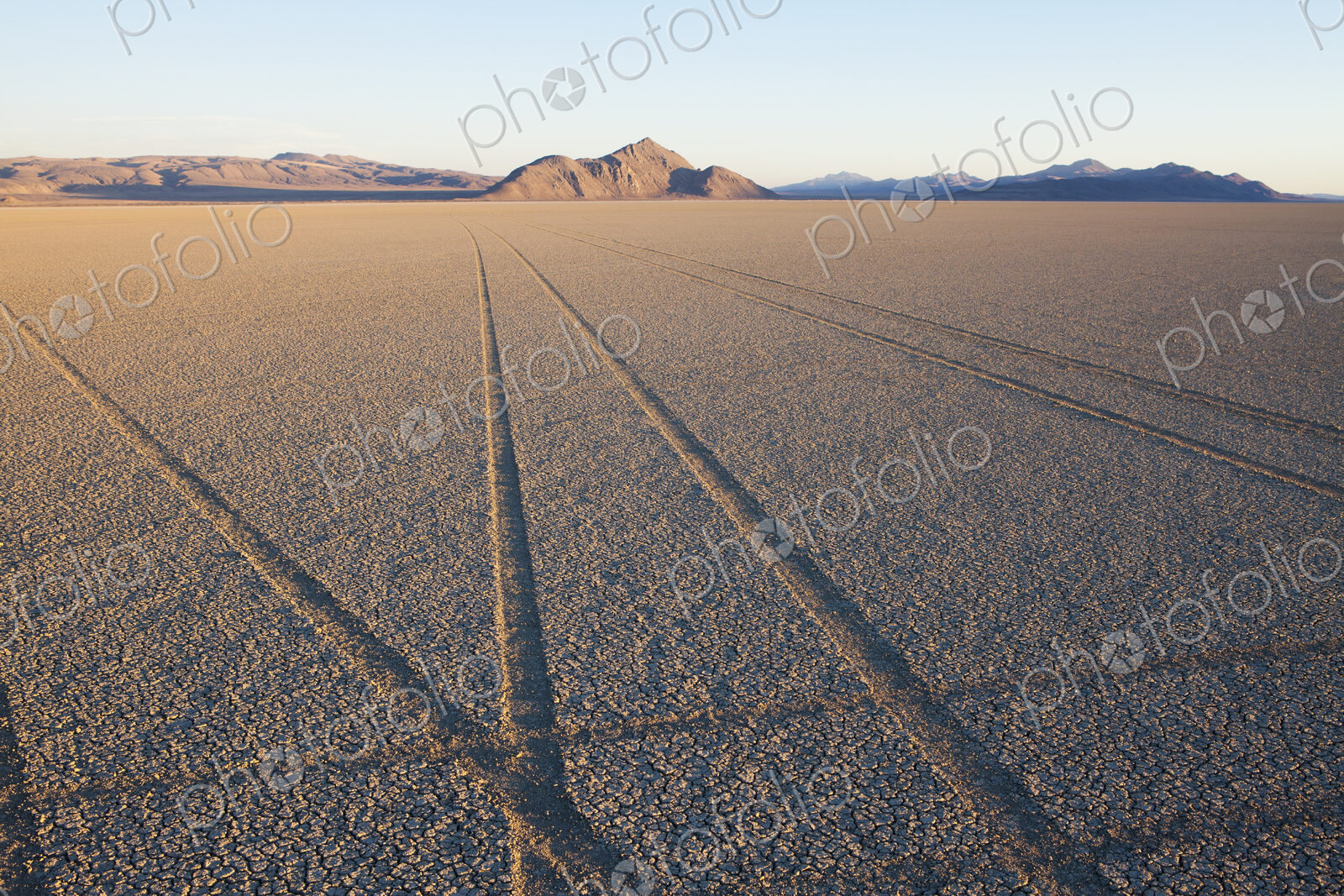 Tyre marks and tracks in the playa salt pan surface of Black Rock Desert, Nevada.