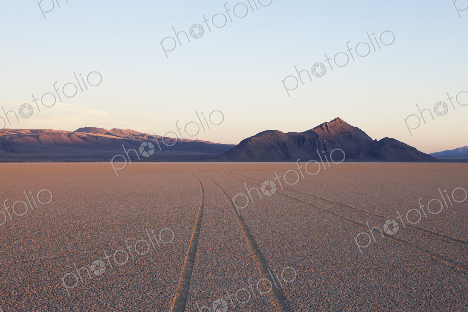 Tyre marks and tracks in the playa salt pan surface of Black Rock Desert, Nevada.
