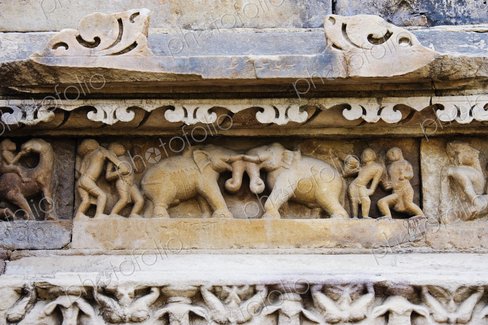 UNESCO World Heritage Site of Khajuraho, a temple frieze, carvings of elephants.