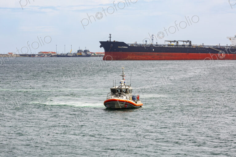 US Coast Guard helicopter demo rescue with rescue swimmer, Port Angeles.