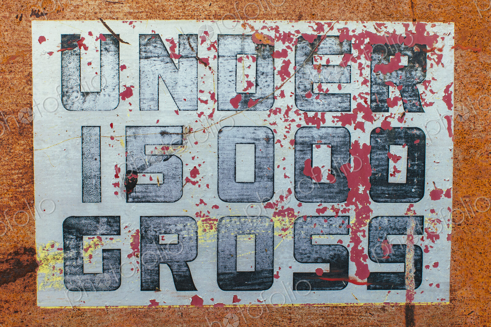 Under 15000 Gross sign painted on side of old truck
