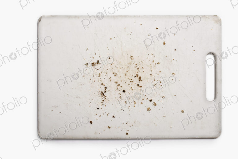 Used Silicon Cutting Board, with crumbs and knife marks