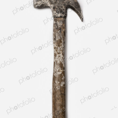 Used Tools. A metal hammer with claw head. A worn marked wooden handle. Used Tools. A metal hammer with claw head. A worn marked wooden handle.