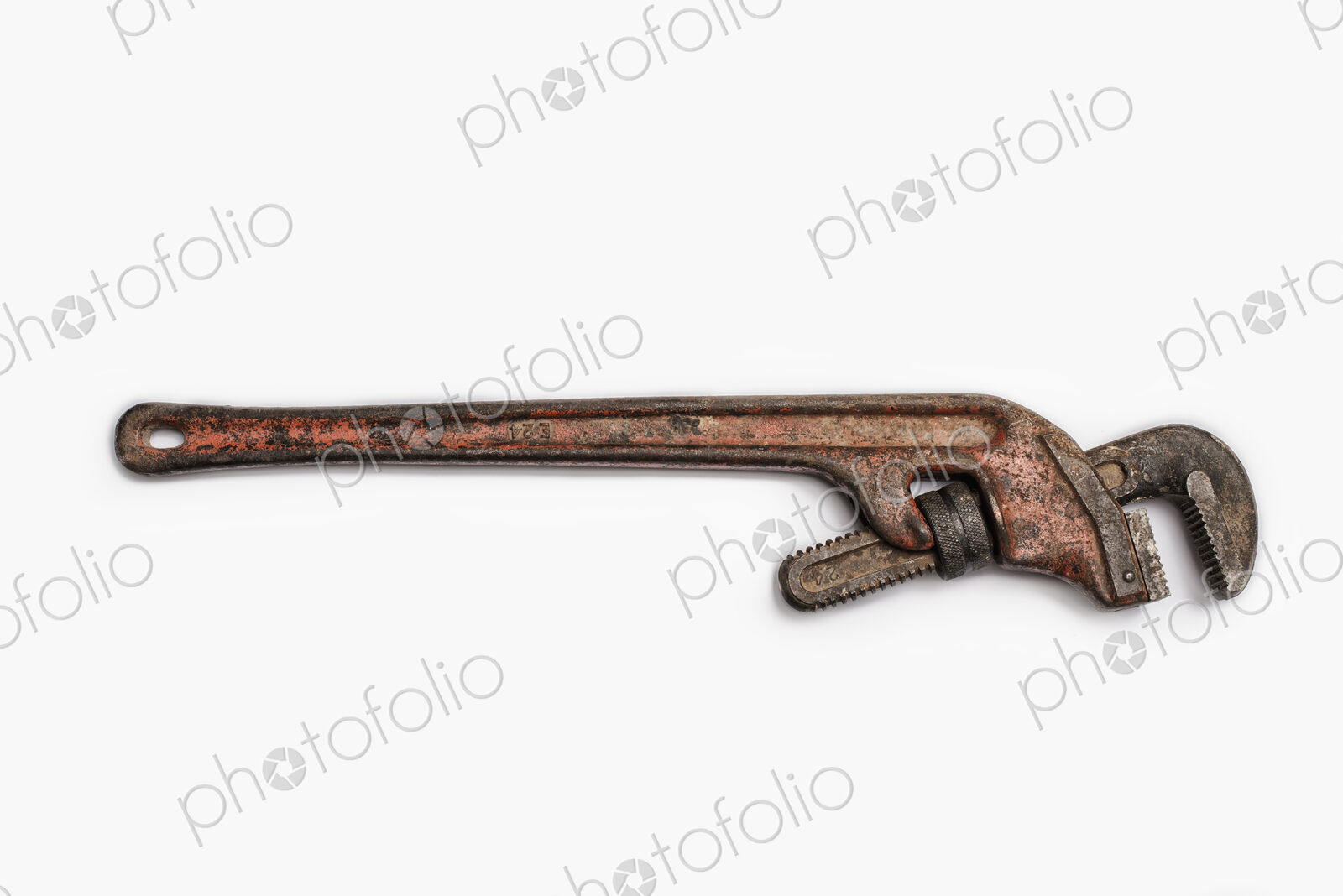 Used Tools. A worn and well used mole wrench or adjustable spanner.