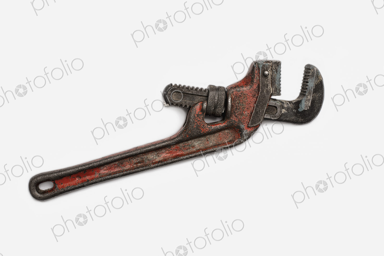 Used Tools. A worn and well used mole wrench or adjustable spanner.