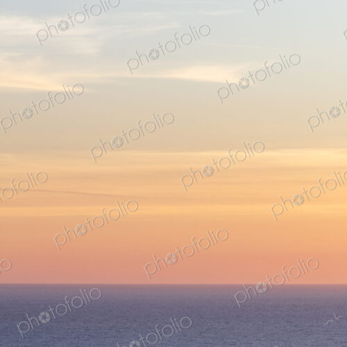 Vast ocean and sky at dusk
