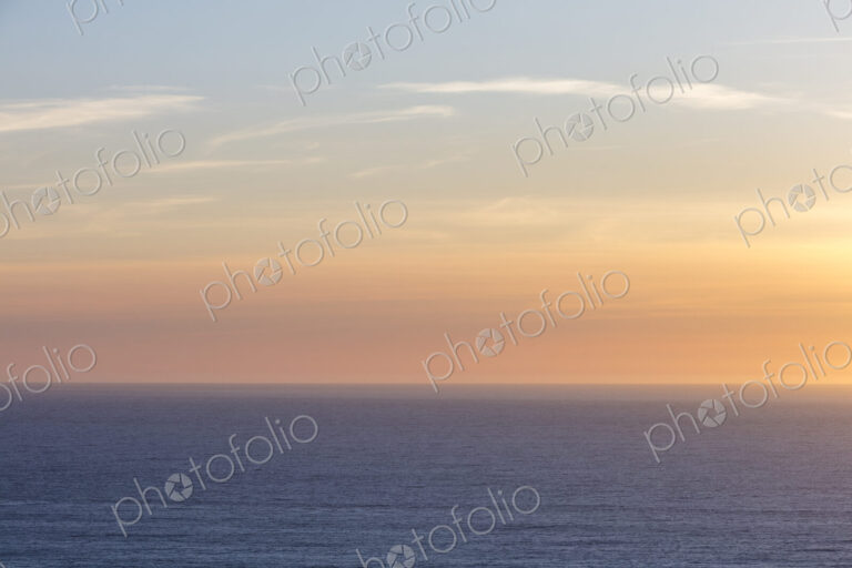 Vast ocean and sky at dusk